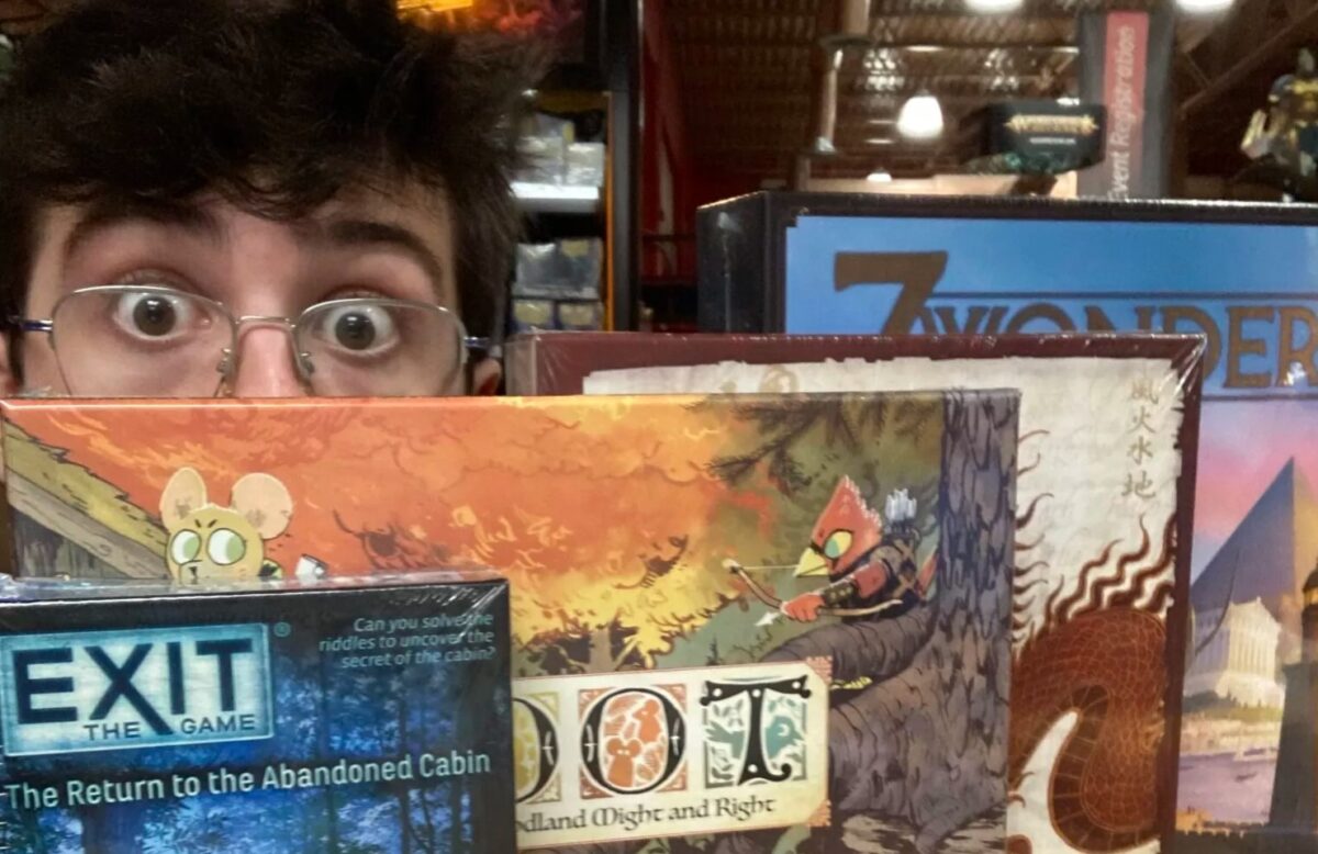 PIcture of Mikey with some board games